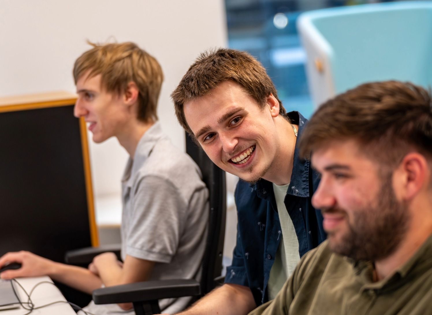 A group of IT technicians at work