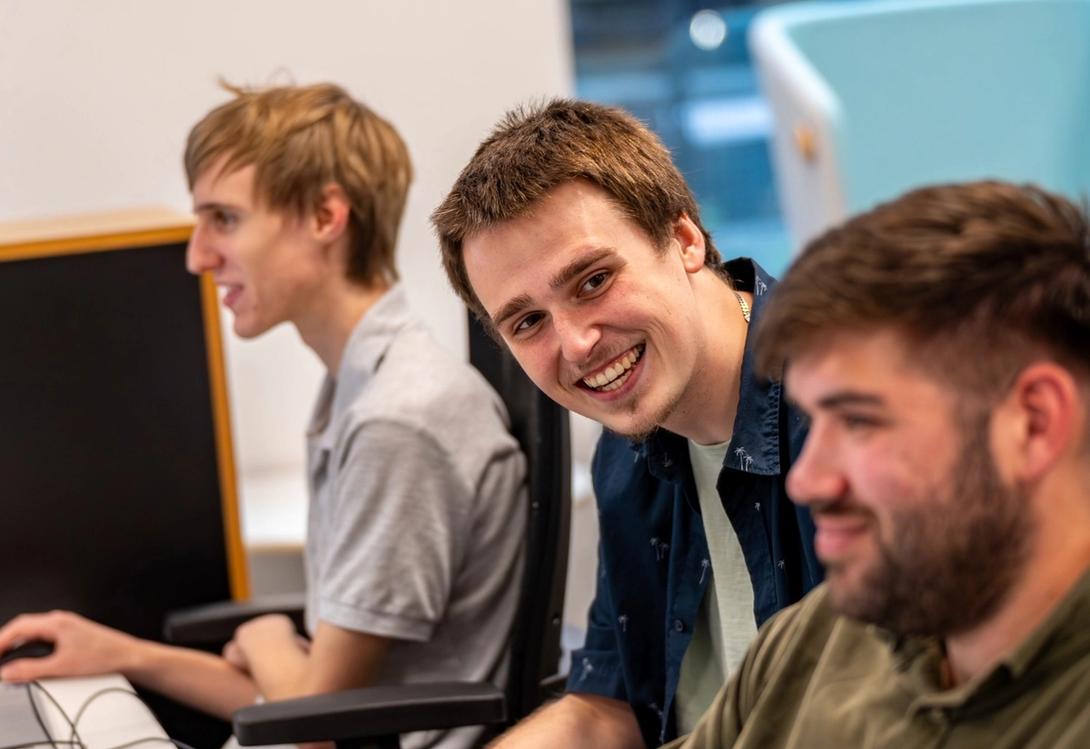 A group of IT technicians at work