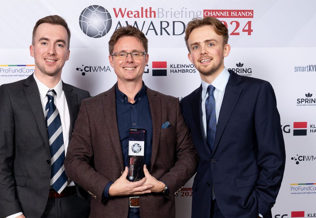 C5 team members receiving a Wealthbriefing aard for Technolgy Excellence